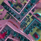 Squid Game players fight their way through the Escher-style stairs.